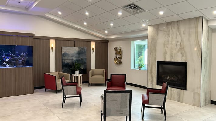 Common area seating arrangement with a fireplace