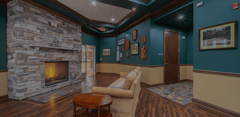 Cozy common area with a fireplace and seating