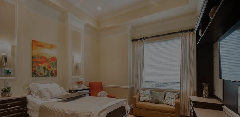 Cozy private room with a bed and seating area