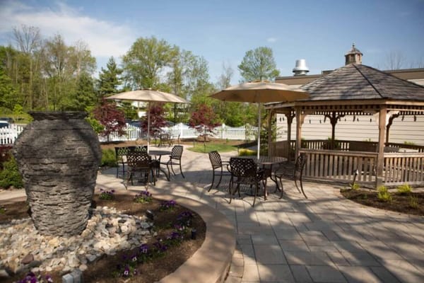 Outdoor patio area with sitting and gazebo