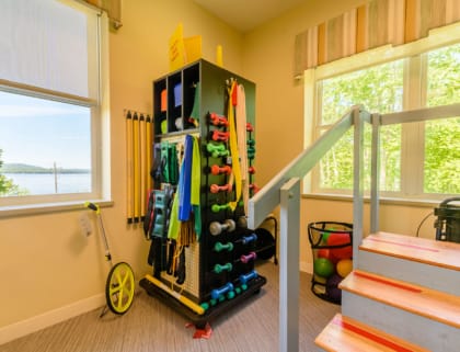 Well-equipped fitness area with weights and exercise gear