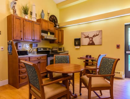 Cozy interior kitchen area with dining tables