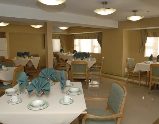 Dining room set up with tables and chairs