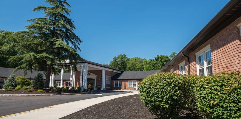 Exterior view of a senior living facility entrance