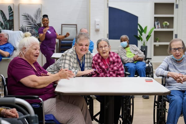 Residents enjoying a group activity in a common area