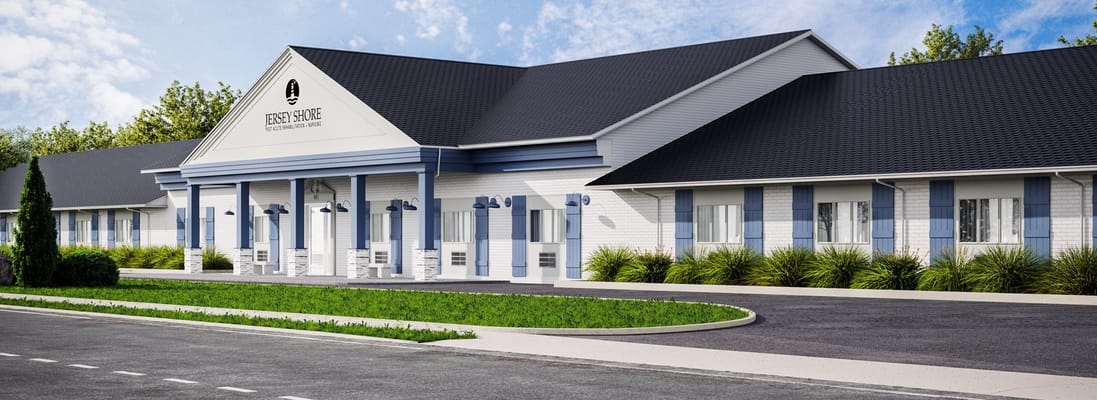 Exterior view of a senior living facility with landscaping