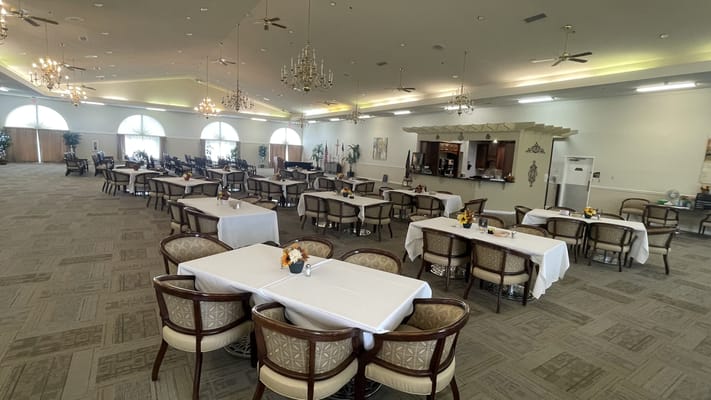 Spacious dining area with tables and chairs