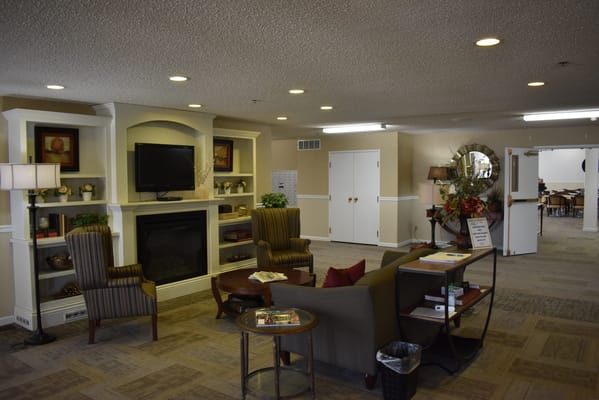 Cozy common area with seating and fireplace