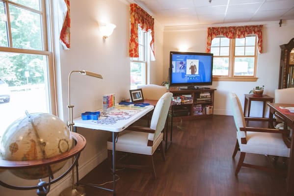 Cozy common area with seating and a television