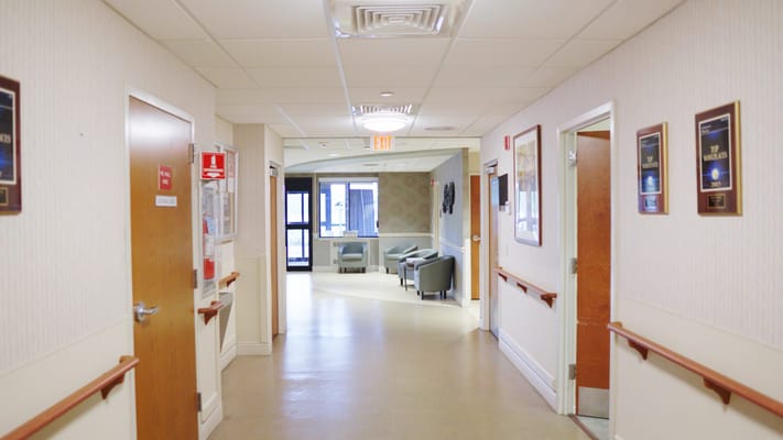 Hallway in a nursing home with seating area