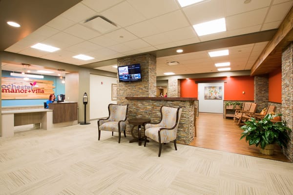 Bright interior of a senior living facility lobby