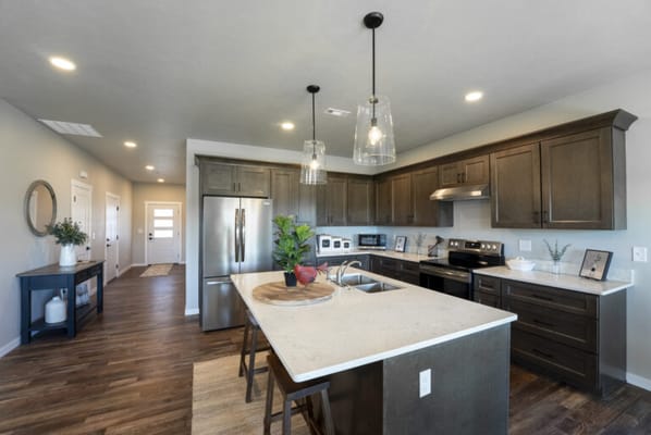 Modern kitchen space with stainless steel appliances