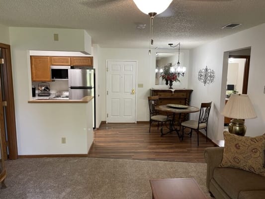 Cozy interior living space with dining area and kitchen