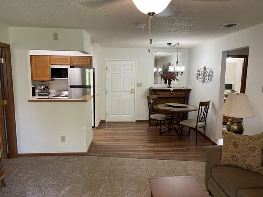 Cozy interior living space with dining area and kitchen