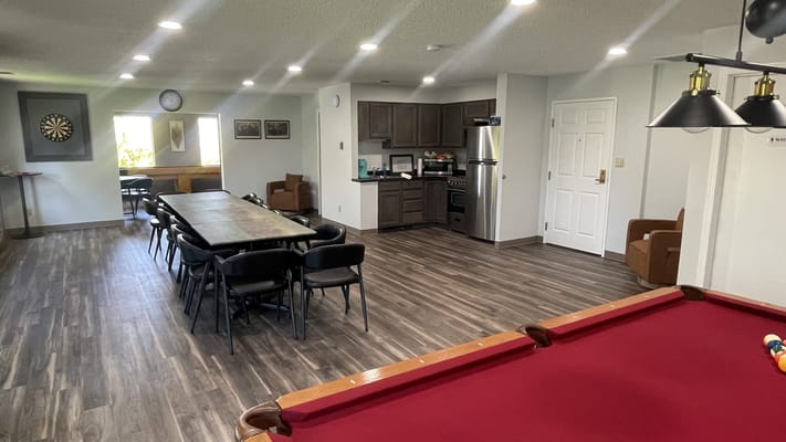 Bright common area with tables and seating