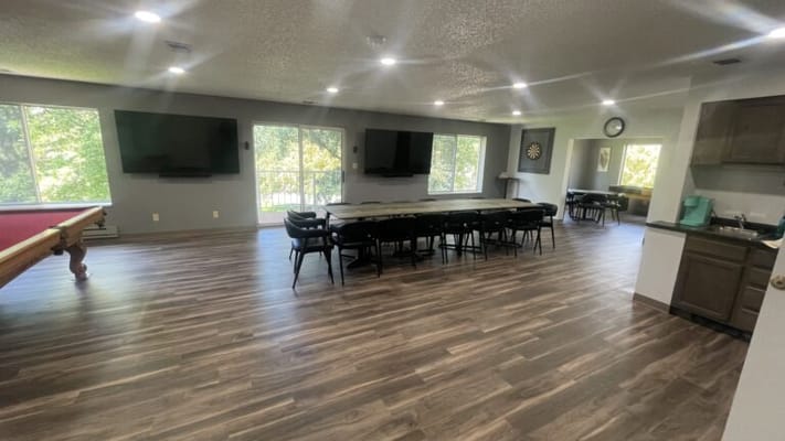 Interior common area with tables and chairs