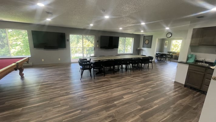 Interior common area with tables and chairs