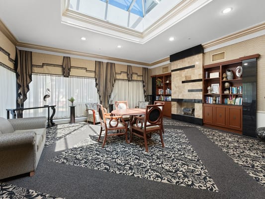 Bright common area with natural lighting and cozy furnishings