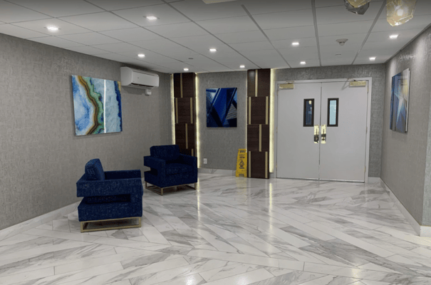 Modern interior of a facility lobby with seating