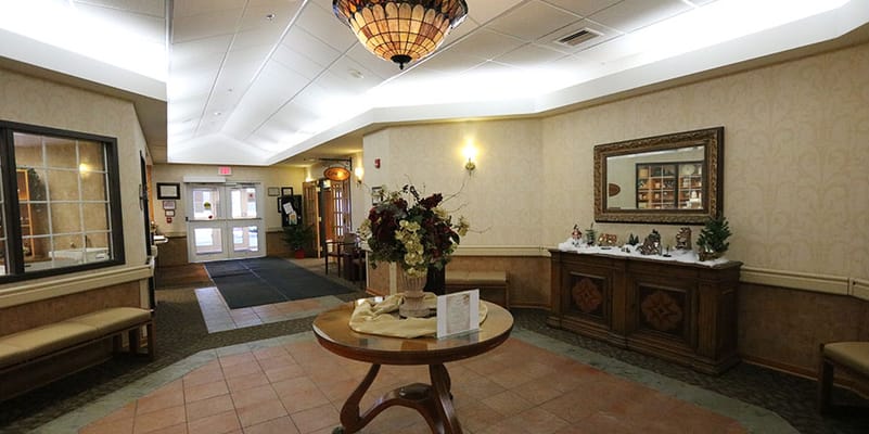 Welcoming lobby area with floral arrangements