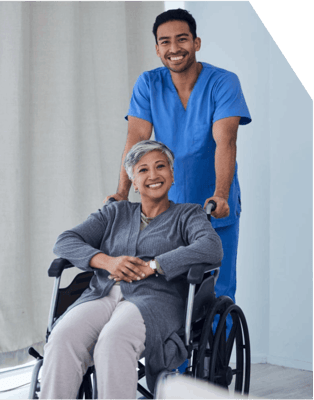 A nurse assisting a senior resident in a cozy setting