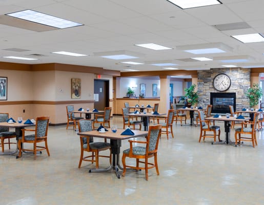 Dining area with tables and clock on the wall