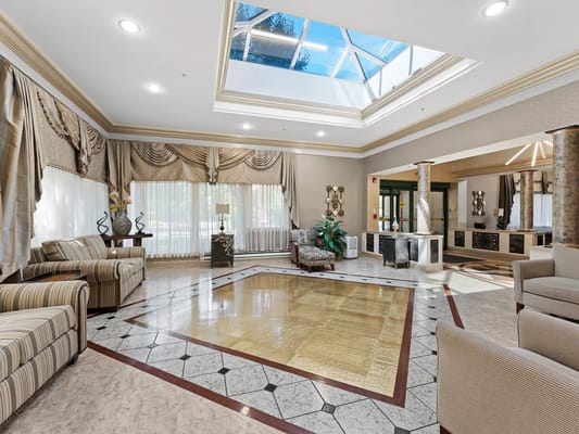 Bright lobby area with high ceilings and natural light