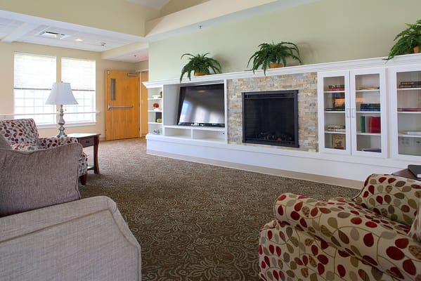 Cozy common area with seating and fireplace