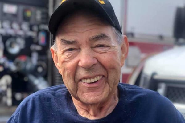 Senior man smiling outdoors