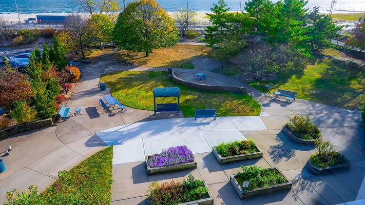 Aerial view of a landscaped outdoor space with seating