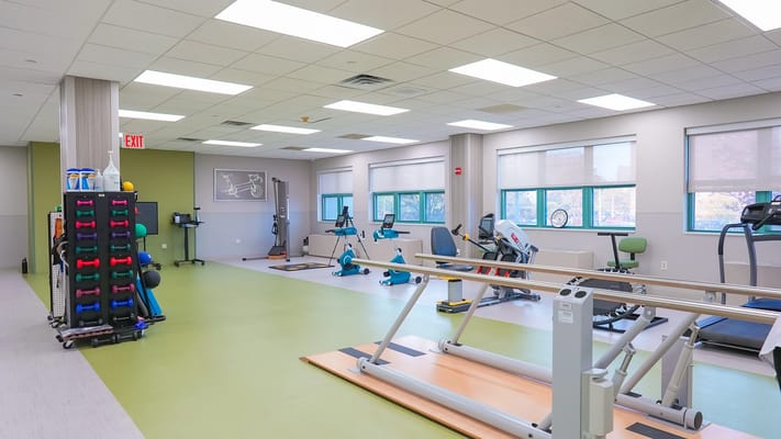 Well-equipped therapy room for senior fitness activities