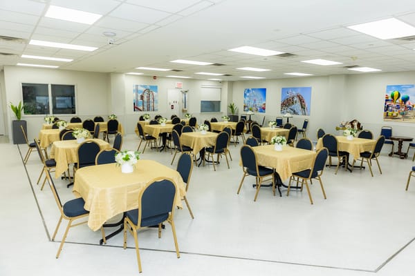 Bright common area with tables and decorations