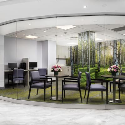 Bright activity room with modern decor and floral arrangements