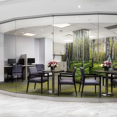 Bright activity room with modern decor and floral arrangements