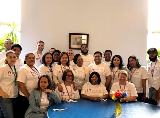 Group of staff members in a common area