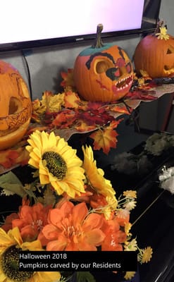Residents' carved pumpkins and fall decorations