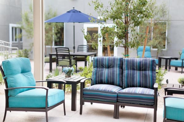 Stylish outdoor seating area with chairs and table