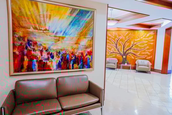 Brightly decorated lobby area with colorful artwork