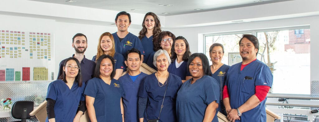 Group photo of staff members in a friendly atmosphere