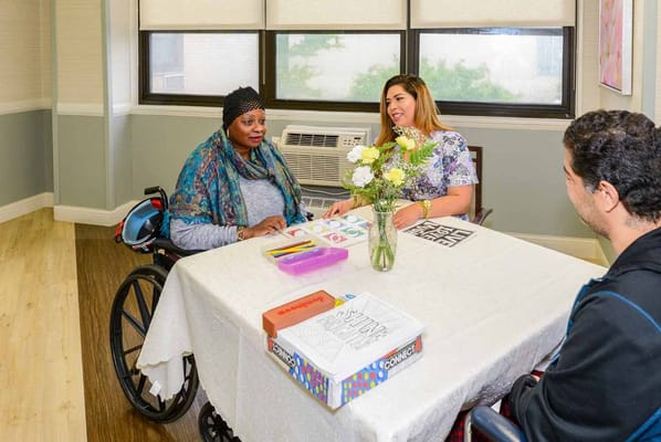 Residents and staff engaging in a group activity