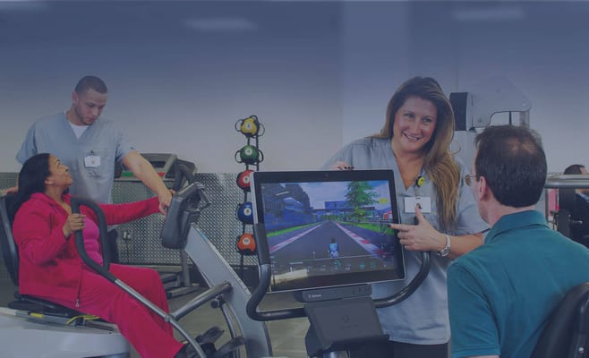 Residents and staff engaging in a fitness activity