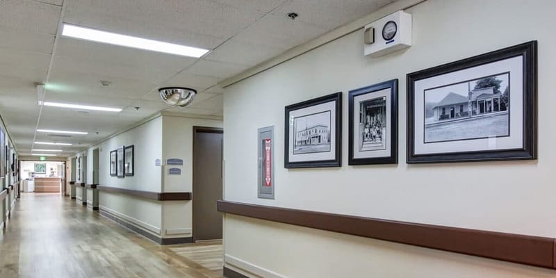Interior hallway with framed photos on the wall