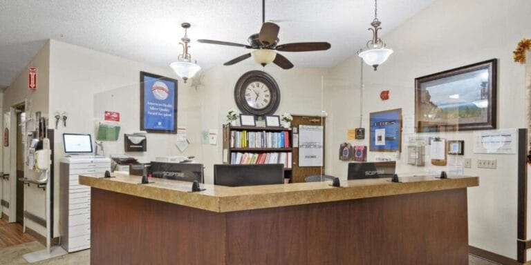 Reception area with a welcoming front desk and decor