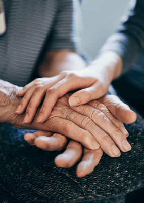 Close-up of hands showing connection between residents