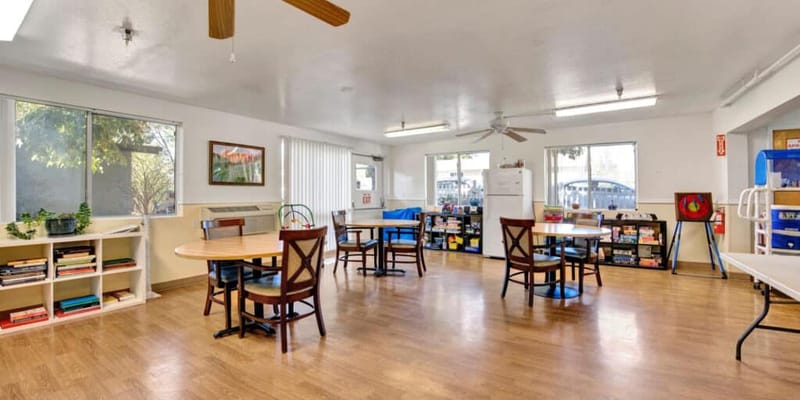 Bright interior common area with tables and chairs