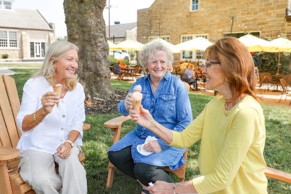 Residents enjoying ice cream on a sunny day