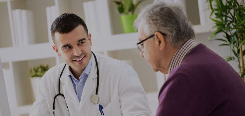 A doctor consulting with a senior resident