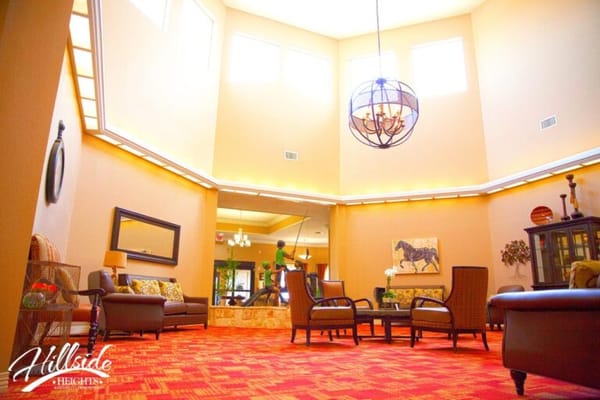 Interior view of a bright common area with seating