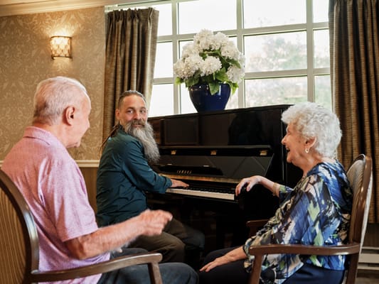 Residents enjoying music in a social area