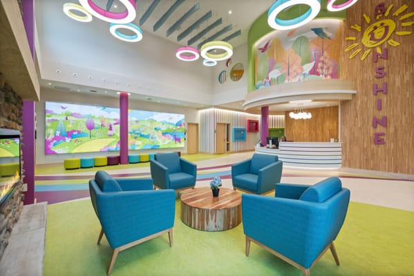 Bright interior lounge area with colorful decor